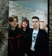 Никита (слева) с двоюродным братом и тетей. Фото из семейного архива